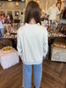 Bow Stitch Mock Neck Top